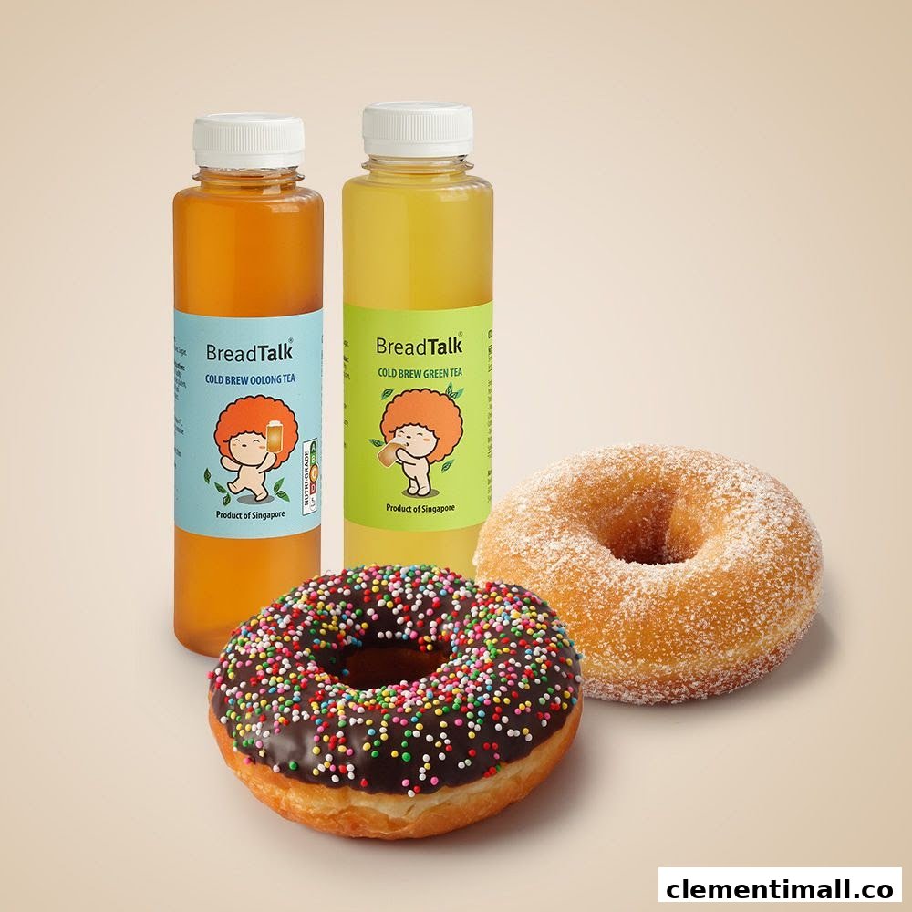 Two BreadTalk cold brew teas and two delicious donuts, one chocolate sprinkle and one sugar-coated.