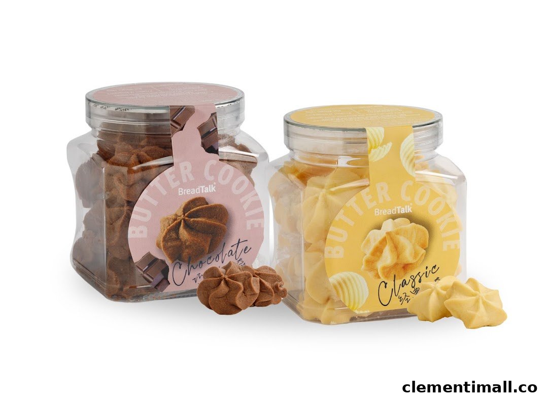 Two clear jars of BreadTalk butter cookies, chocolate and classic flavors, with loose cookies.