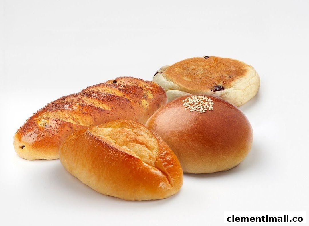 A variety of freshly baked breads and pastries from BreadTalk displayed on a clean white background.