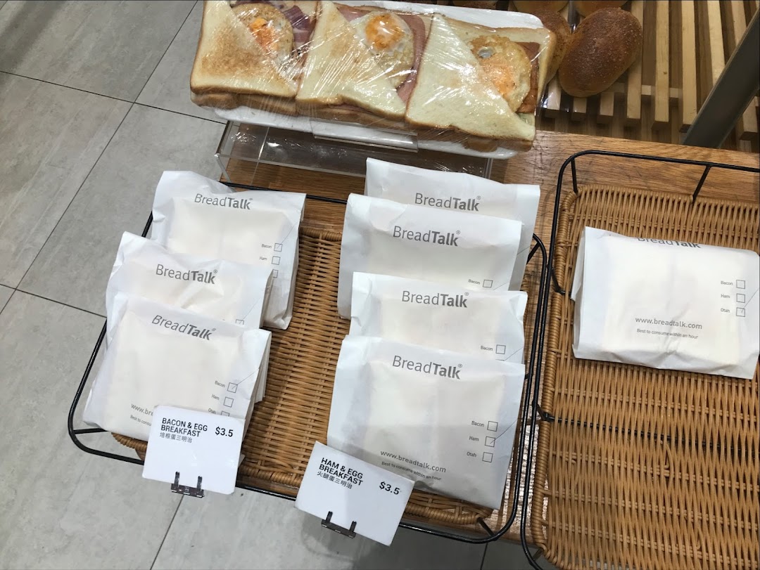 Freshly prepared breakfast sandwiches and baked goods displayed at BreadTalk, ready for grab-and-go.