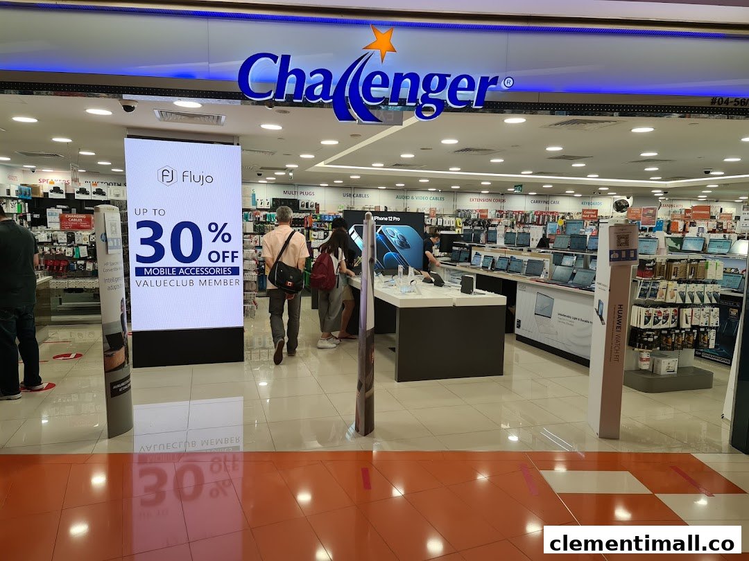 The entrance of Challenger electronics store, showcasing product displays and a mobile accessories promotion.