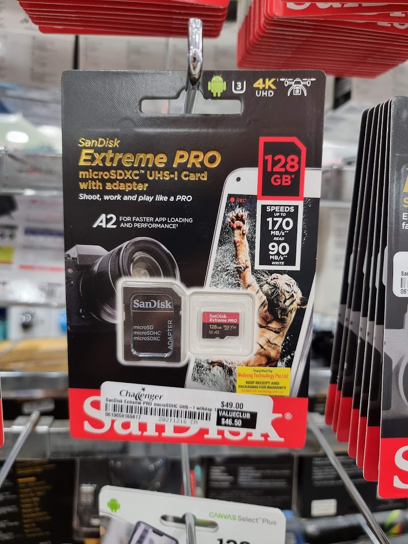 A SanDisk Extreme PRO microSDXC card package displayed on a rack at Challenger.