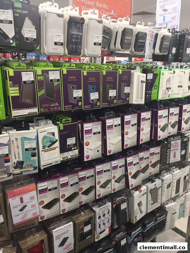 A retail display showcasing various power banks and wireless chargers.