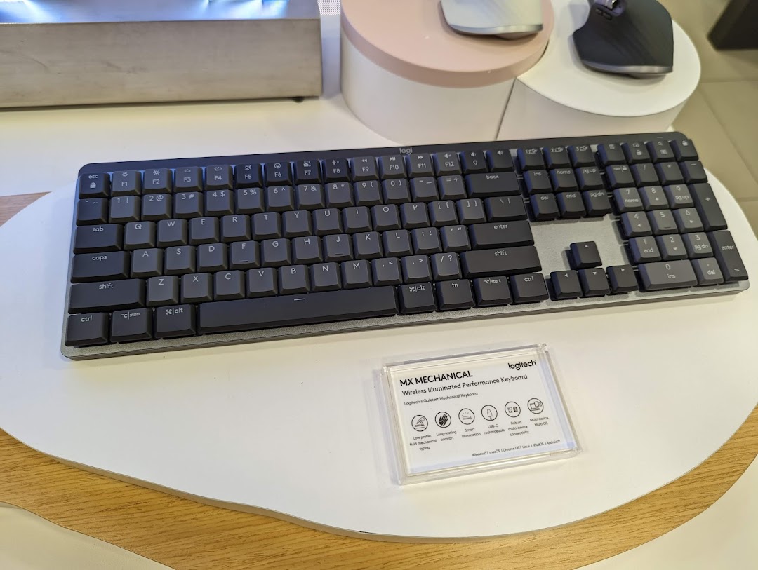 A Logitech MX Mechanical keyboard displayed with its product information card at Challenger.