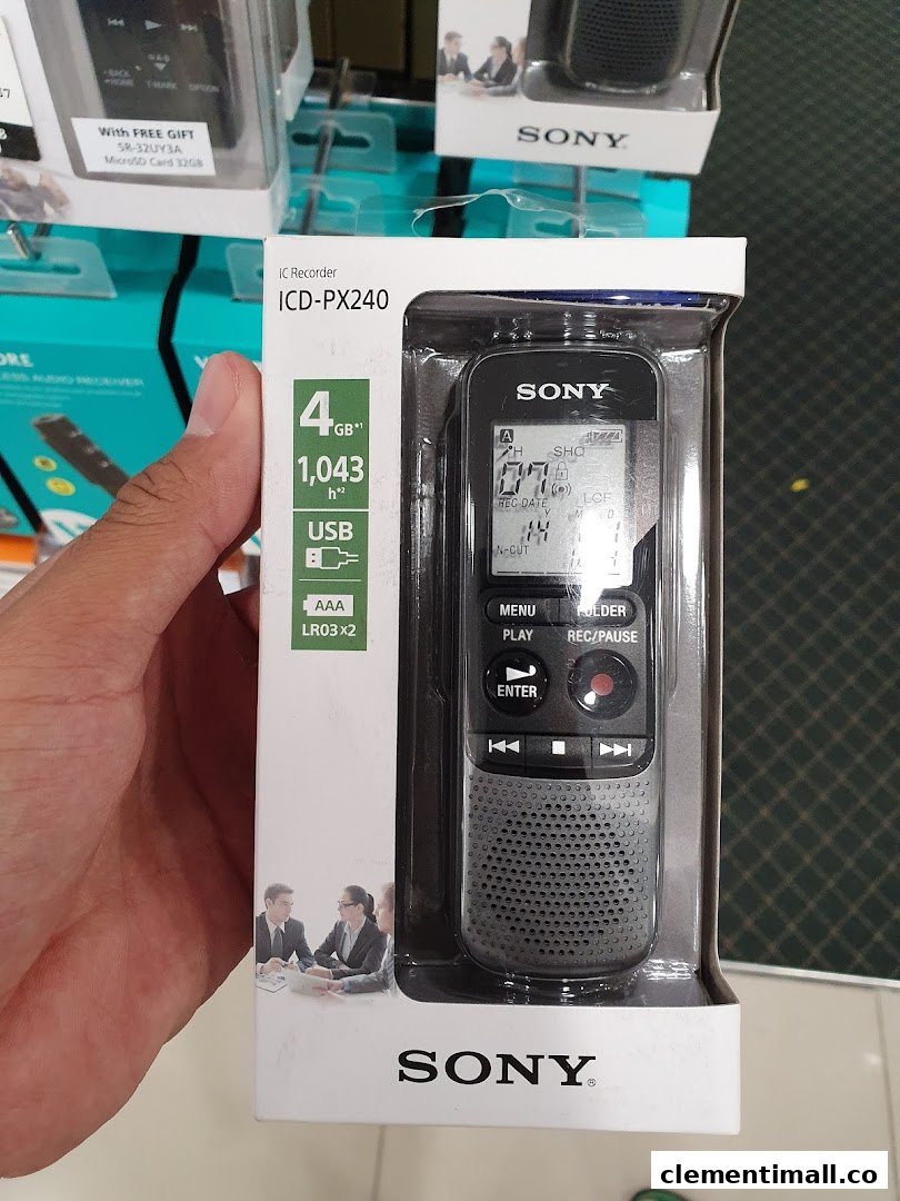 A hand holds a packaged Sony IC Recorder ICD-PX240 in a retail store.