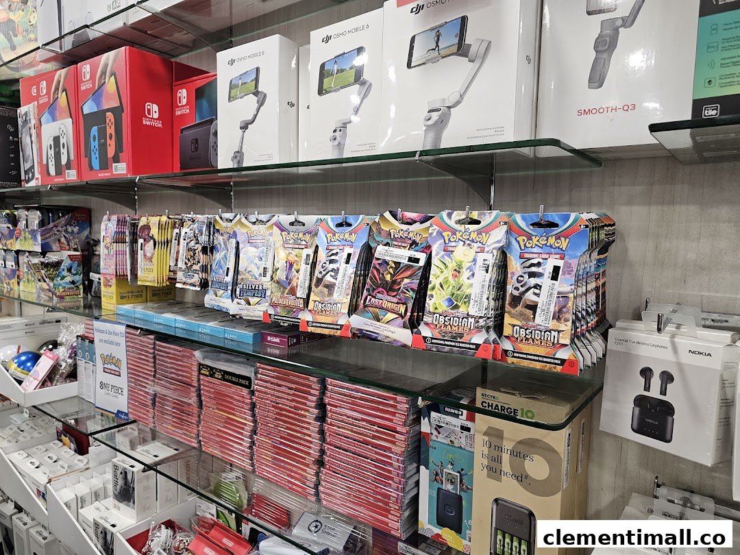 Shelves filled with Nintendo Switch consoles, DJI gimbals, Pokémon cards, and various electronics accessories.