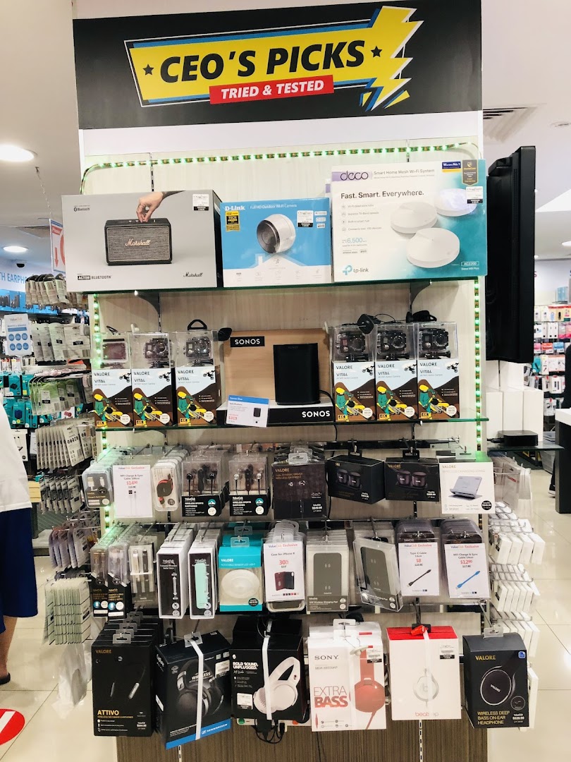 A vibrant display of electronics, including speakers, cameras, and headphones, featuring 'CEO's Picks'.