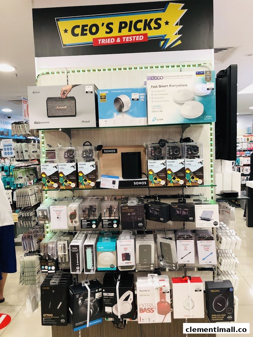 A vibrant display of electronics, including speakers, cameras, and headphones, featuring 'CEO's Picks'.