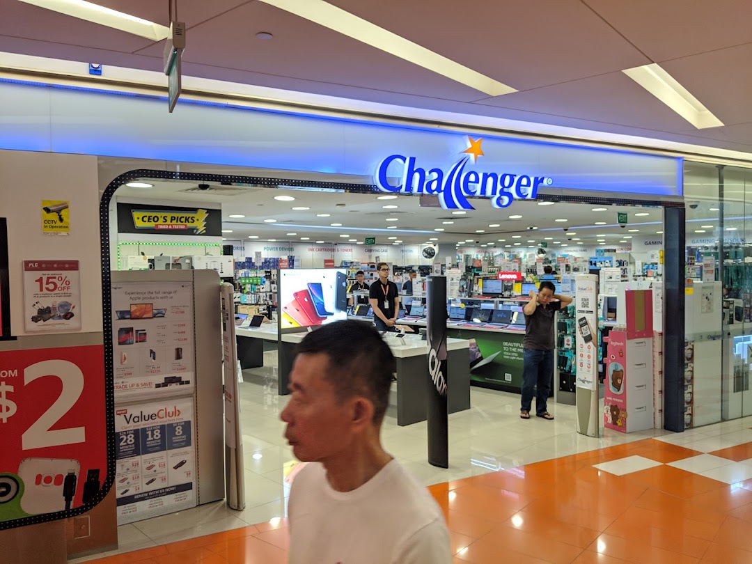 The bright entrance of Challenger electronics store, showcasing a wide range of tech products.