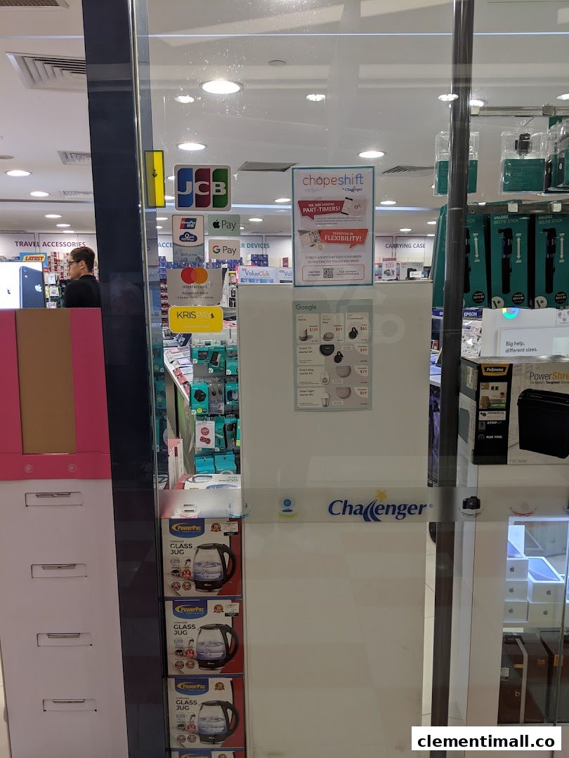 View of Challenger's glass shop front, displaying payment options, hiring info, and electronics.