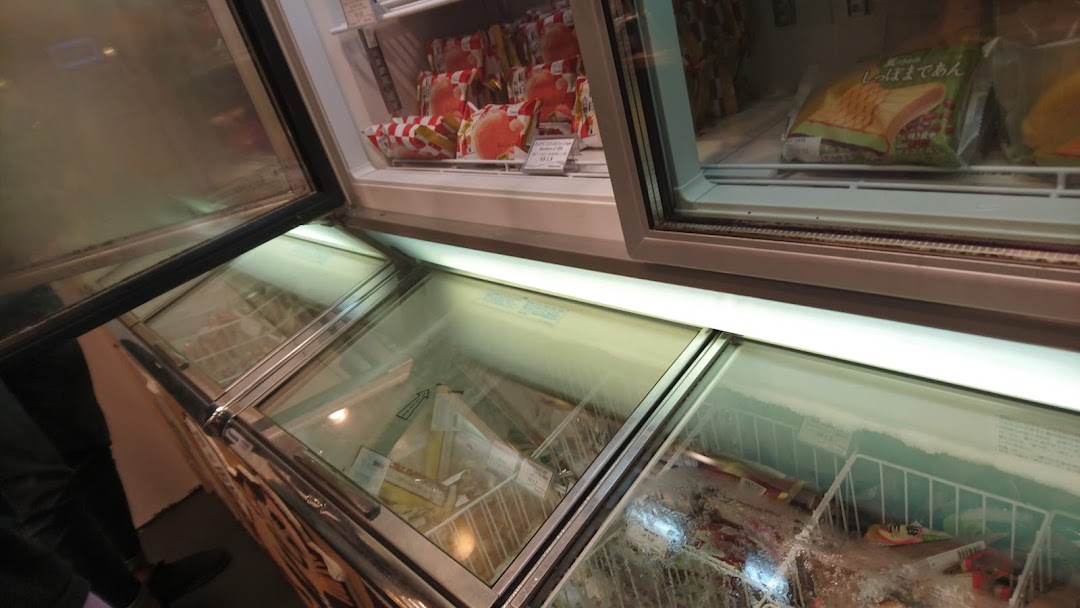 View of Châteraisé's display freezers filled with various Japanese frozen desserts and ice cream.