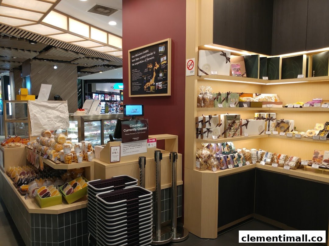 Interior view of Châteraisé, a Japanese confectionery shop, showcasing a variety of sweets, gifts, and a counter.