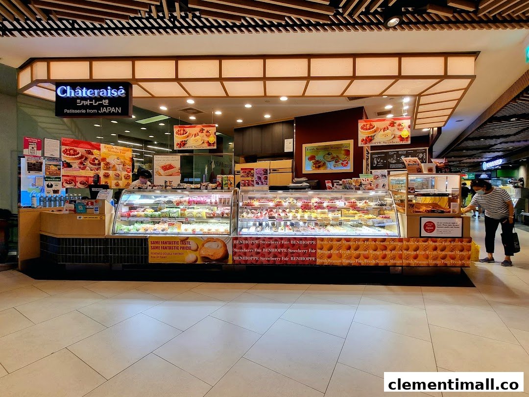 A vibrant Châteraisé patisserie shop front showcasing display cases filled with an array of Japanese cakes and pastries.