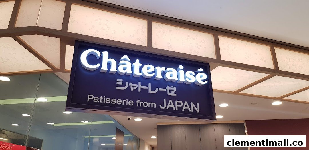 The illuminated Châteraisé shop sign, featuring its name and 'Patisserie from JAPAN', above the entrance.