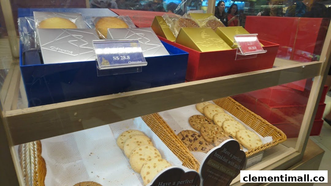 A display case showcasing Châteraisé's delicious cookies, pastries, and gift boxes.