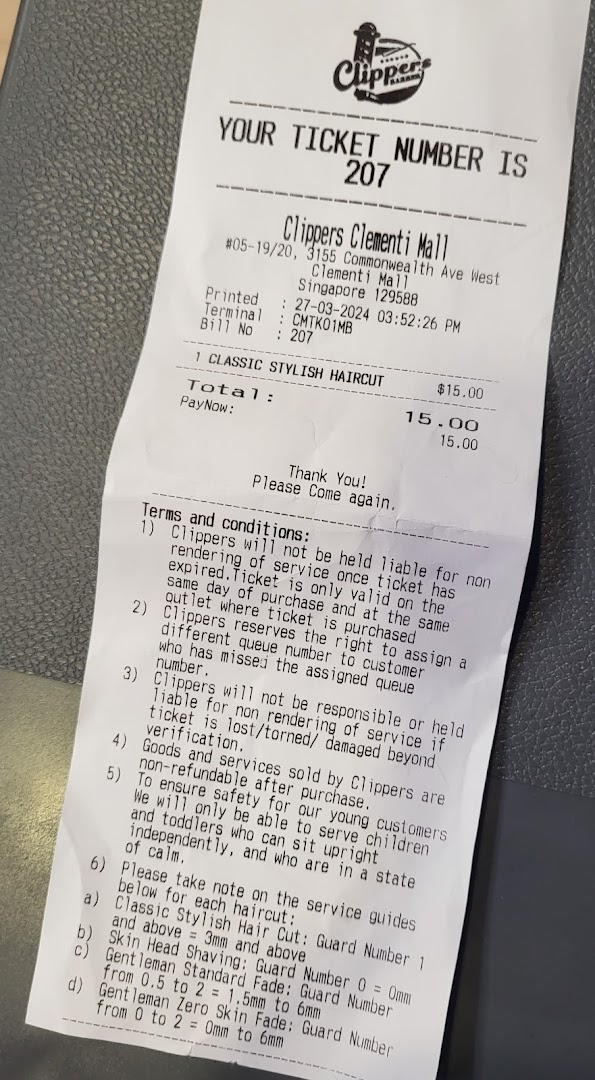 A receipt from Clippers Barber Clementi Mall detailing a classic stylish haircut service and terms.
