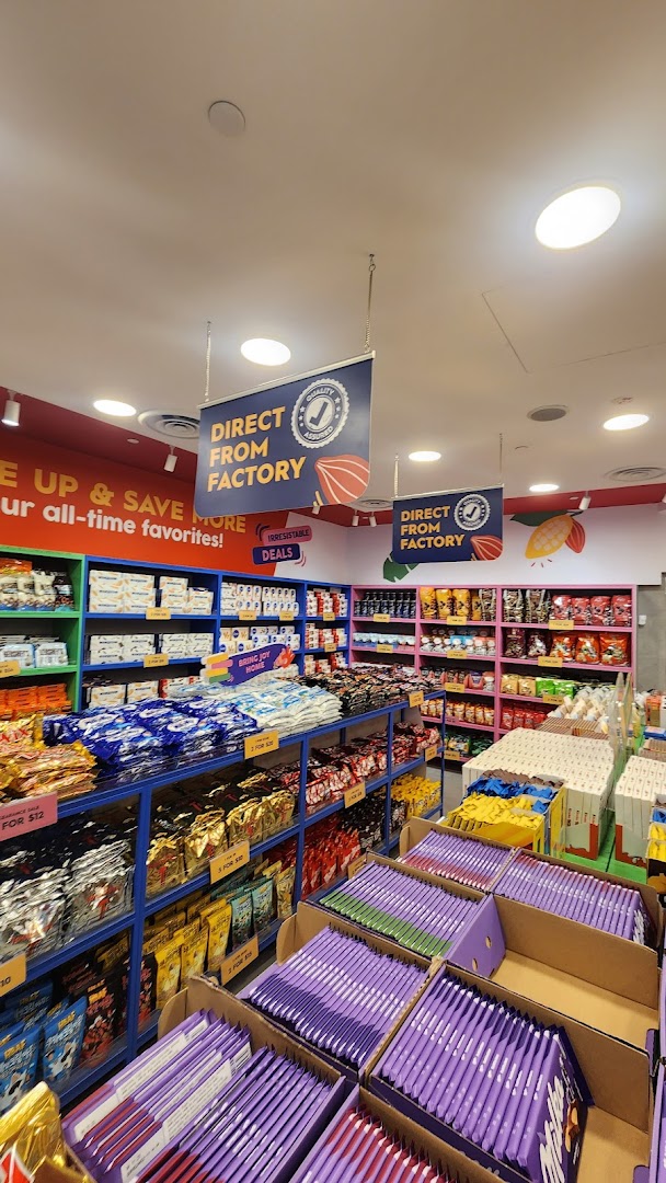 An interior view of Cocoa Pods by The Cocoa Trees, showcasing a wide array of chocolates and snacks.
