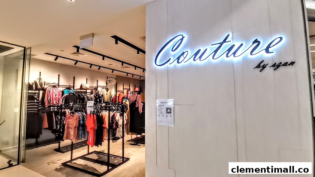 View of Couture by szan's illuminated entrance and vibrant clothing displays inside.