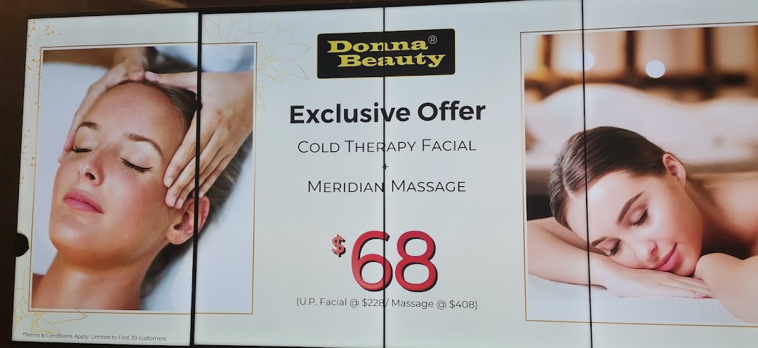 A promotional sign for Donna Beauty showcasing an exclusive offer for a Cold Therapy Facial and Meridian Massage.