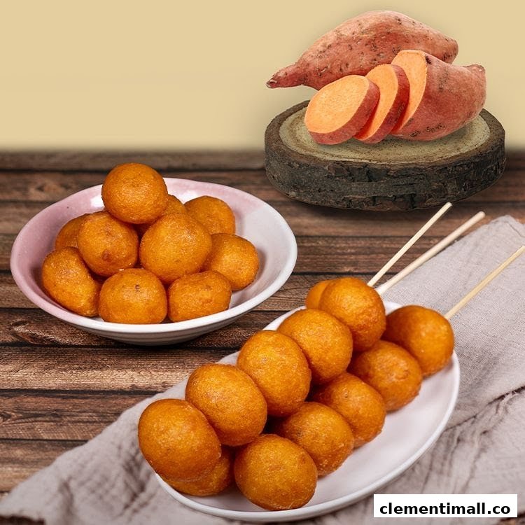 Golden sweet potato balls served in a bowl and on skewers, with fresh sweet potatoes.