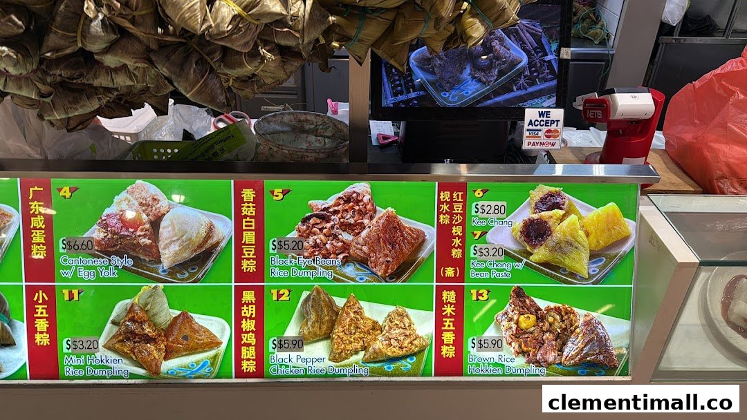 A vibrant display of various traditional rice dumplings with their prices and descriptions.