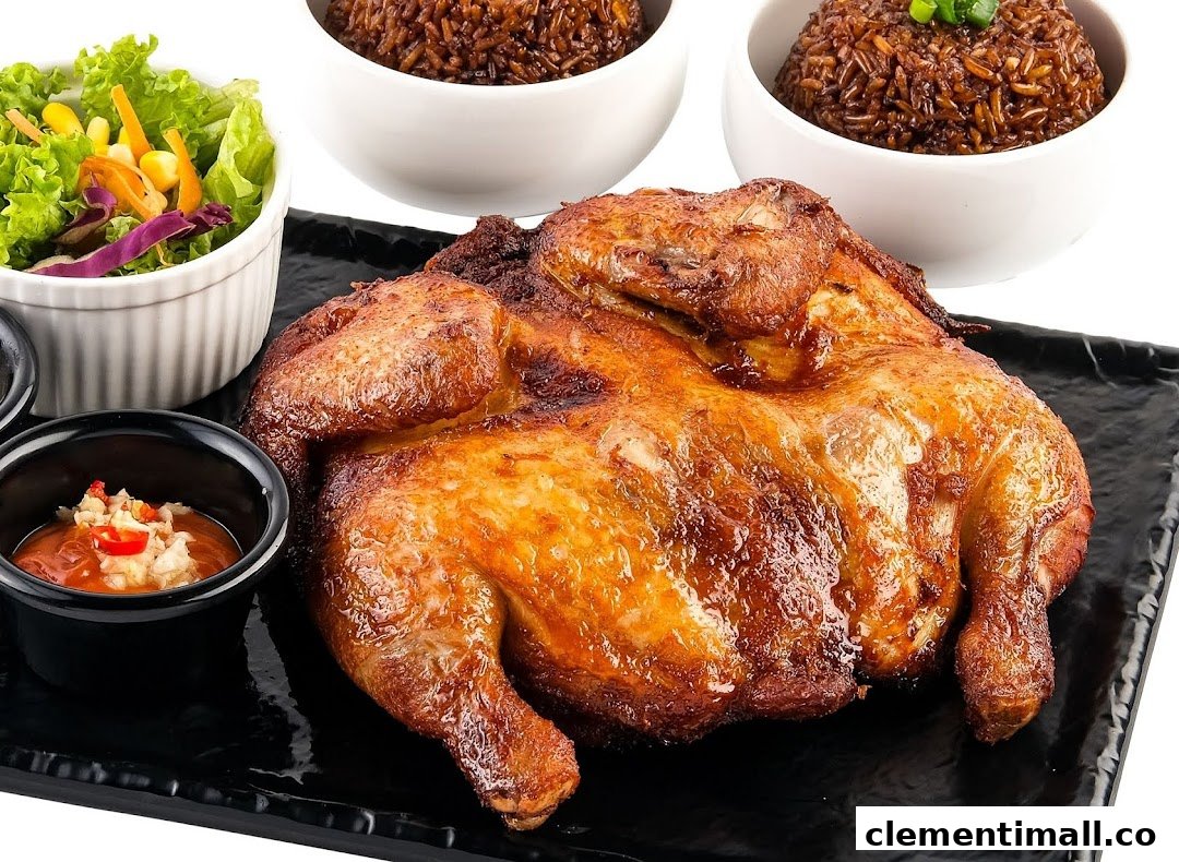 A perfectly roasted whole chicken served with flavorful rice, fresh salad, and dipping sauce.