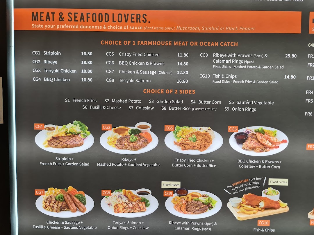A detailed menu board displaying meat and seafood main courses with side dish options.