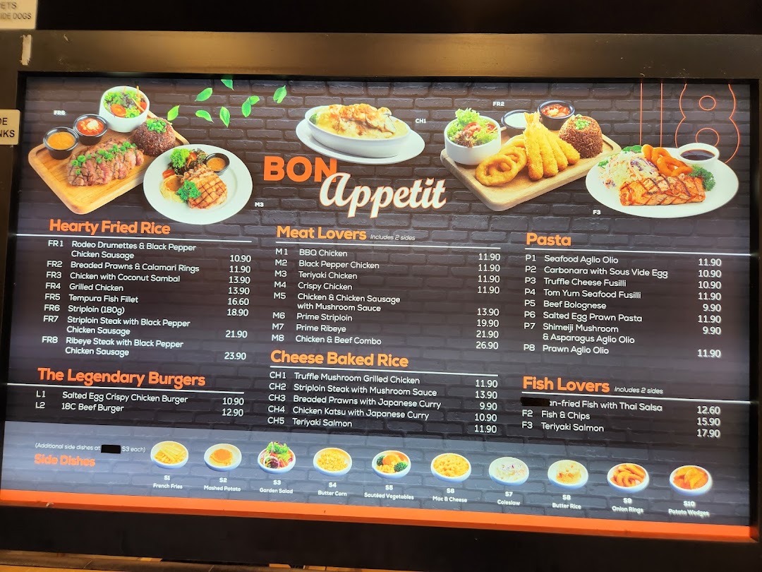 A vibrant digital menu board displaying a variety of Western and Asian fusion dishes with prices.