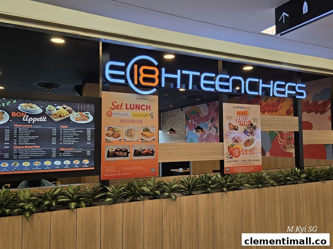 The shop front of Eighteen Chefs Clementi Mall, featuring its neon sign and promotional posters for set lunches and student meals.
