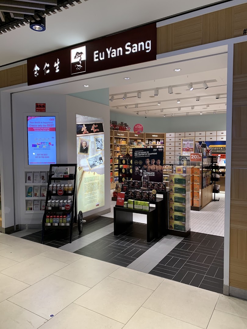 The storefront of Eu Yan Sang, showcasing its entrance and a glimpse of health and wellness products.