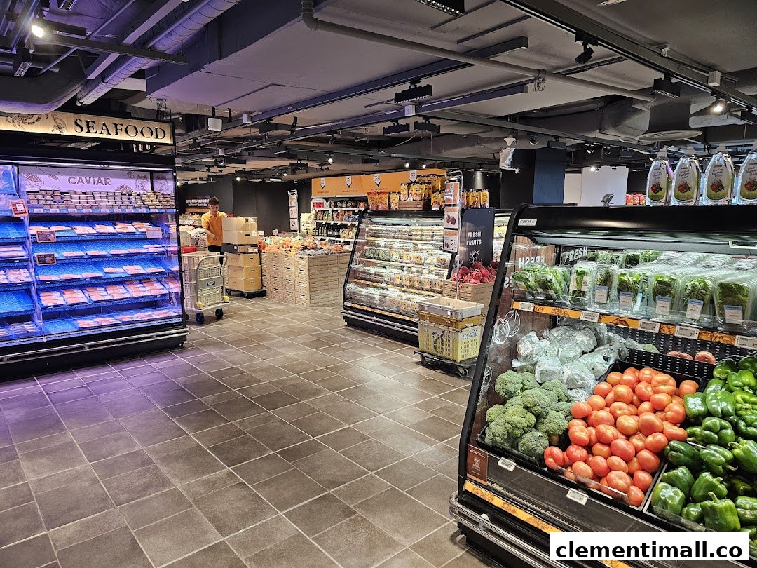 Interior view of FairPrice Finest supermarket showcasing fresh produce, seafood, and a well-stocked environment.