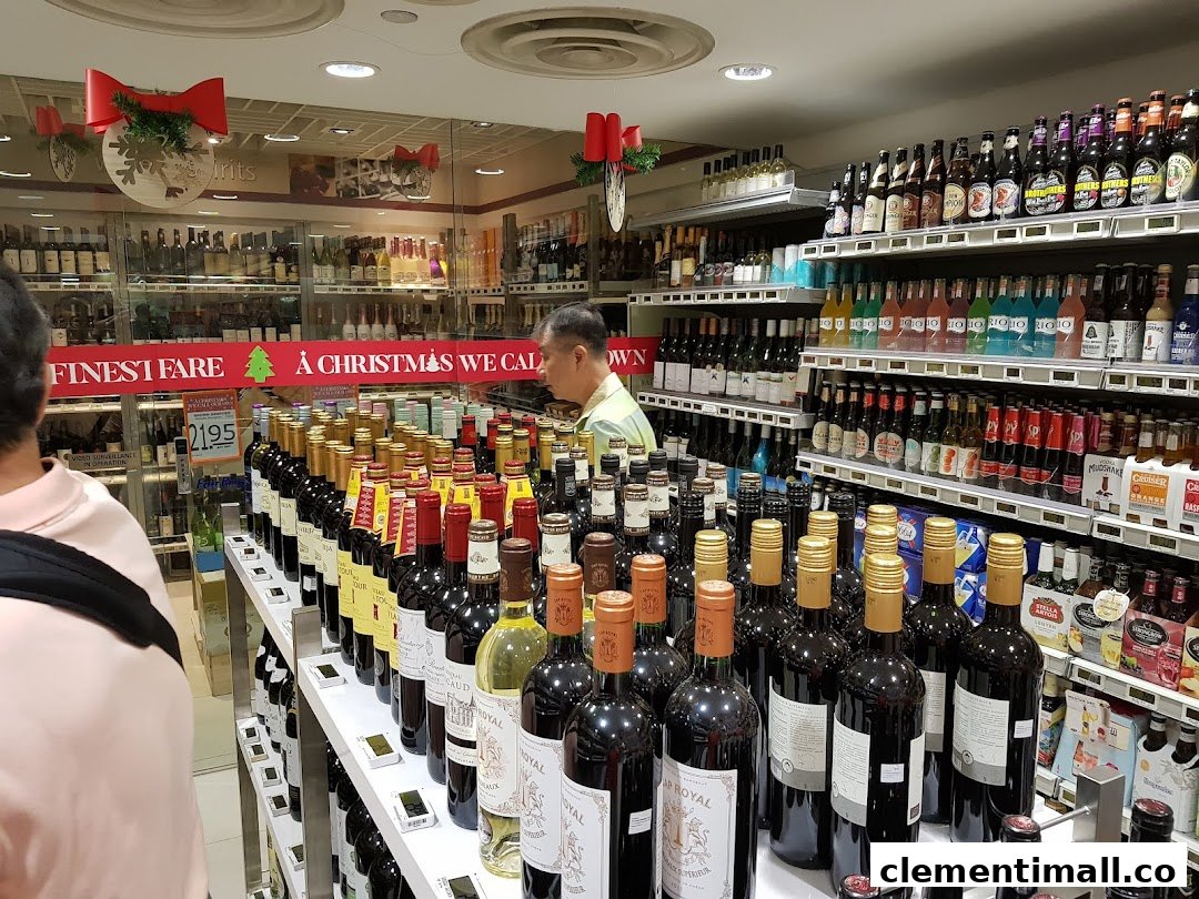 Interior view of FairPrice Finest's alcohol section, featuring a wide array of wines, spirits, and beers.