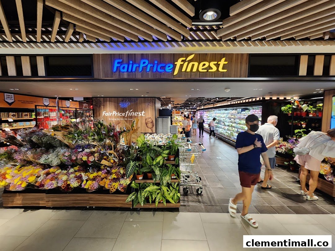A vibrant view inside FairPrice Finest, showcasing fresh flowers, plants, and a wide array of groceries.