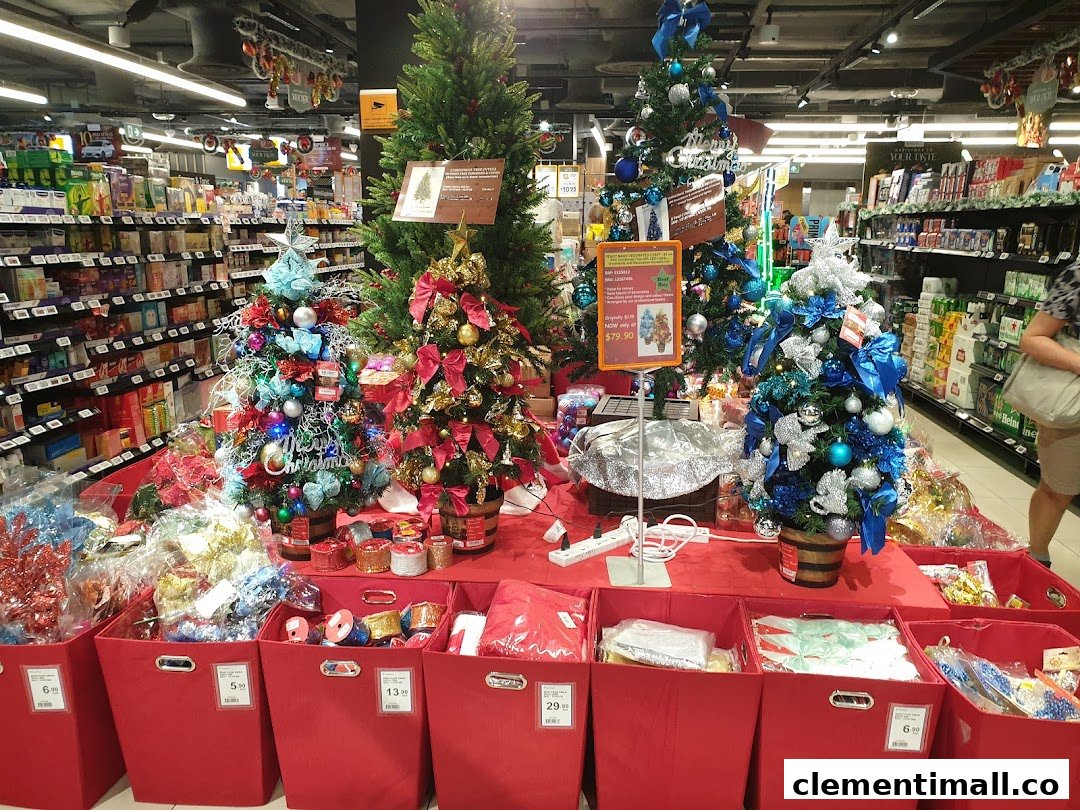 A festive display of Christmas trees and decorations inside FairPrice Finest supermarket.