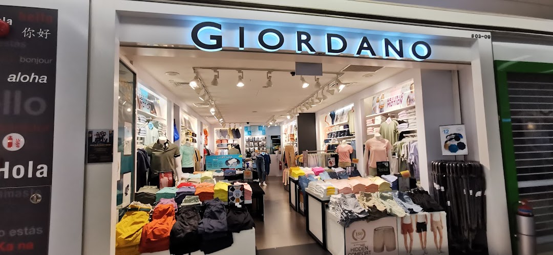 The storefront of Giordano, an apparel shop, showcasing a wide range of casual clothing and accessories.