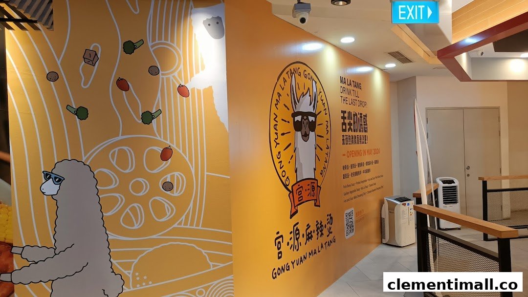 Vibrant yellow shop exterior of Gong Yuan Ma La Tang featuring a cool llama mascot and opening details.