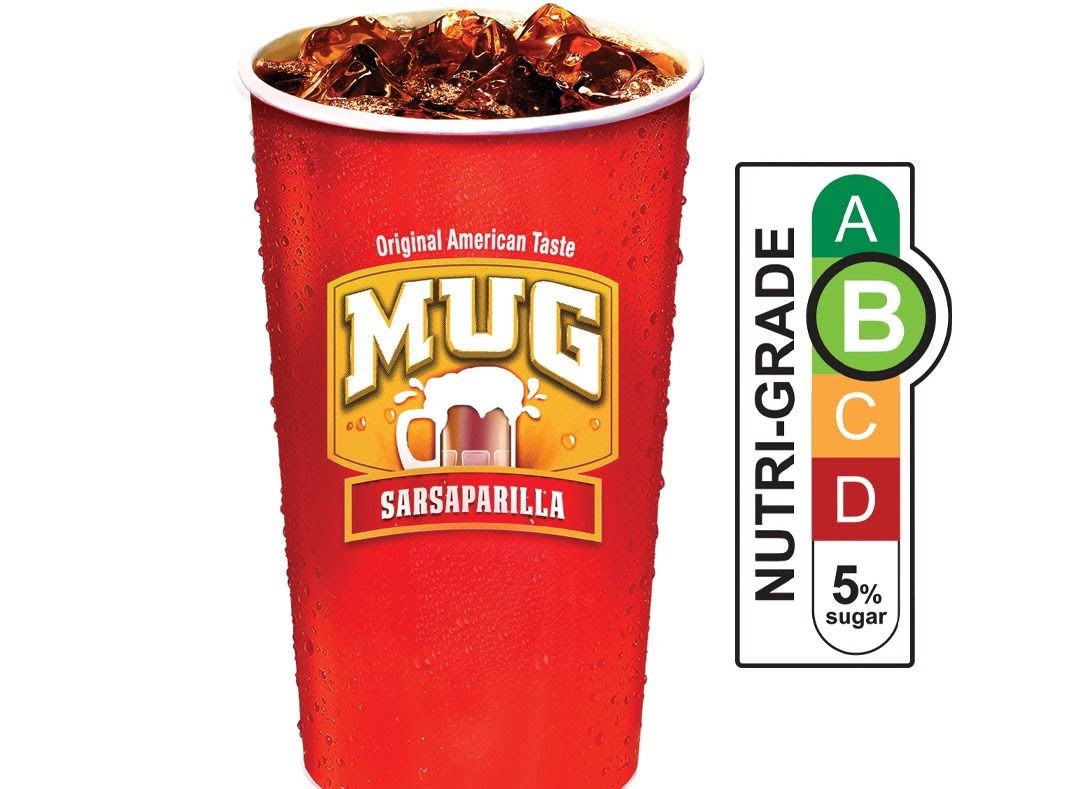 A red cup of Mug Sarsaparilla with ice and a Nutri-Grade B label.