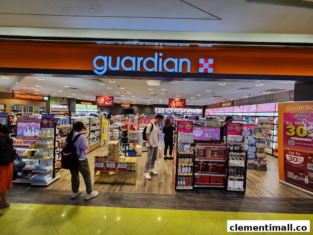 The entrance of a Guardian Health & Beauty pharmacy, showcasing various health and beauty products.