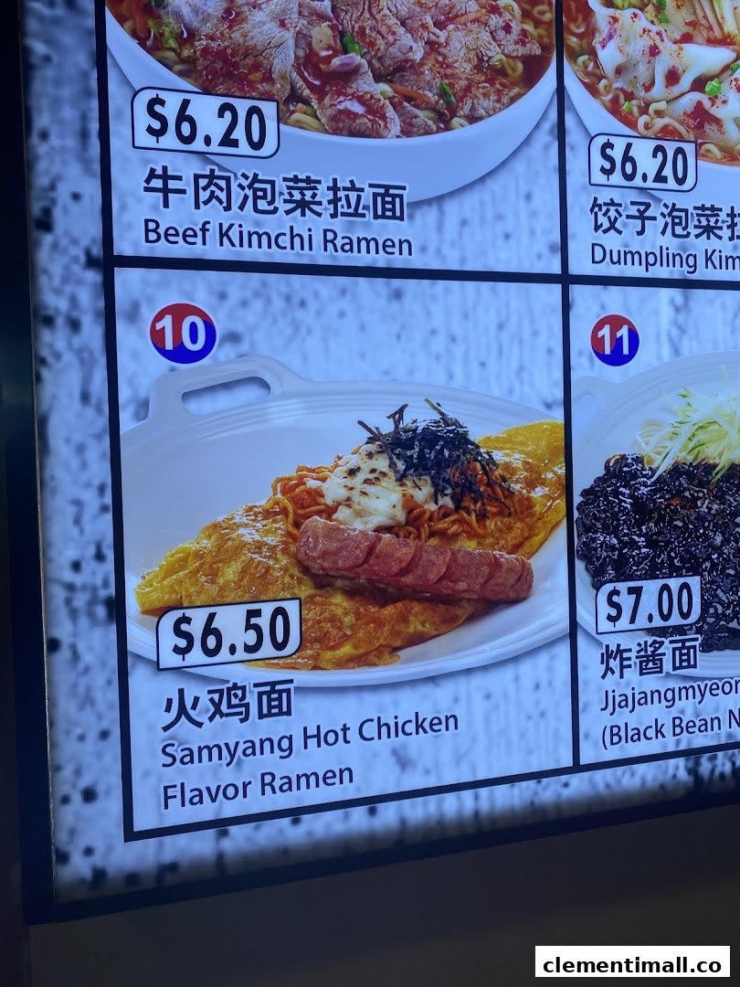 A vibrant menu board displaying various Korean ramen and noodle dishes with prices and images.