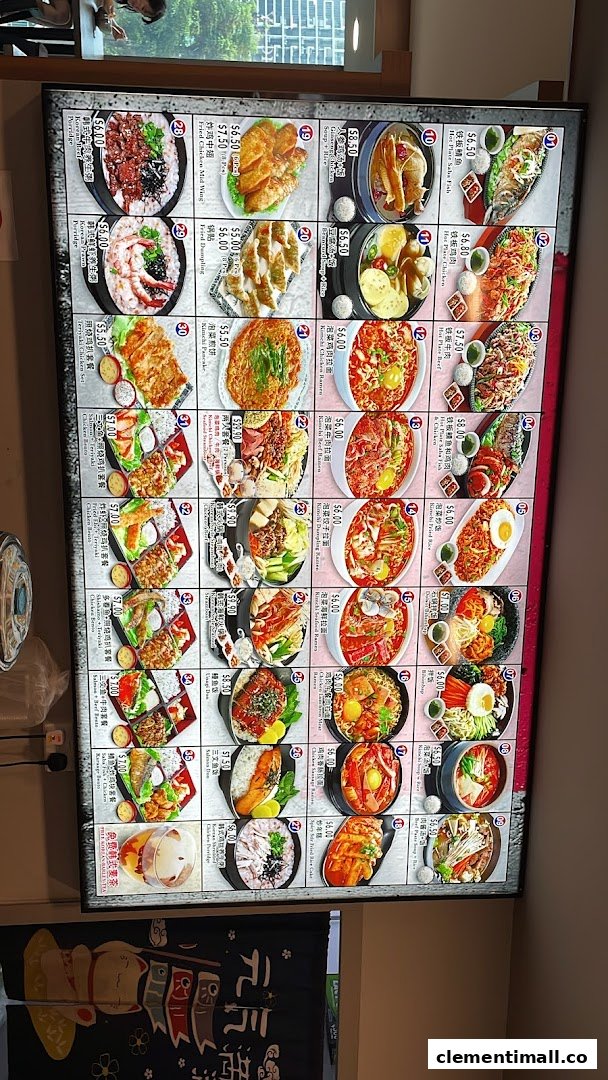 A brightly lit menu board showcasing a variety of Korean dishes with images and prices.