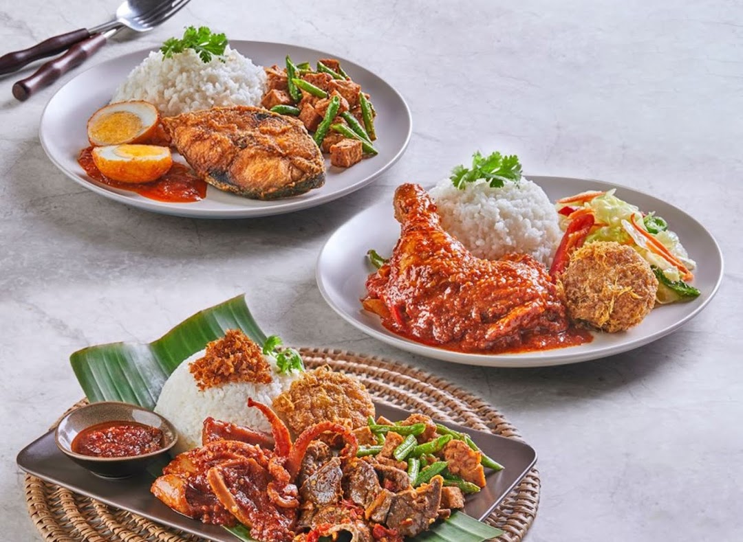 Three plates of traditional Malay/Indonesian dishes featuring rice, various meats, vegetables, and sambal.