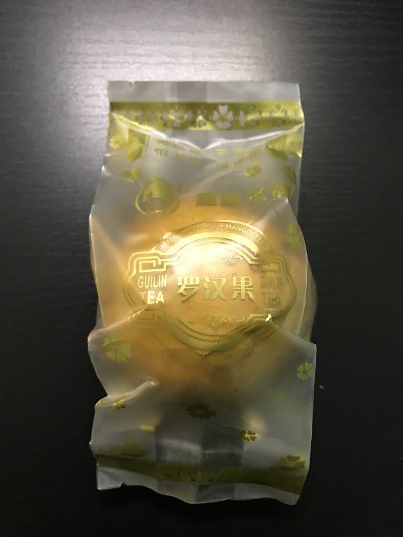 A clear plastic package of Guilin Tea with golden accents, likely a health tonic product.