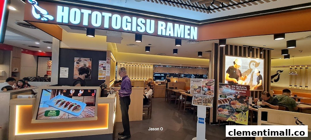 The inviting entrance of Hototogisu Ramen at Clementi Mall, showcasing its bright signage and dining area.
