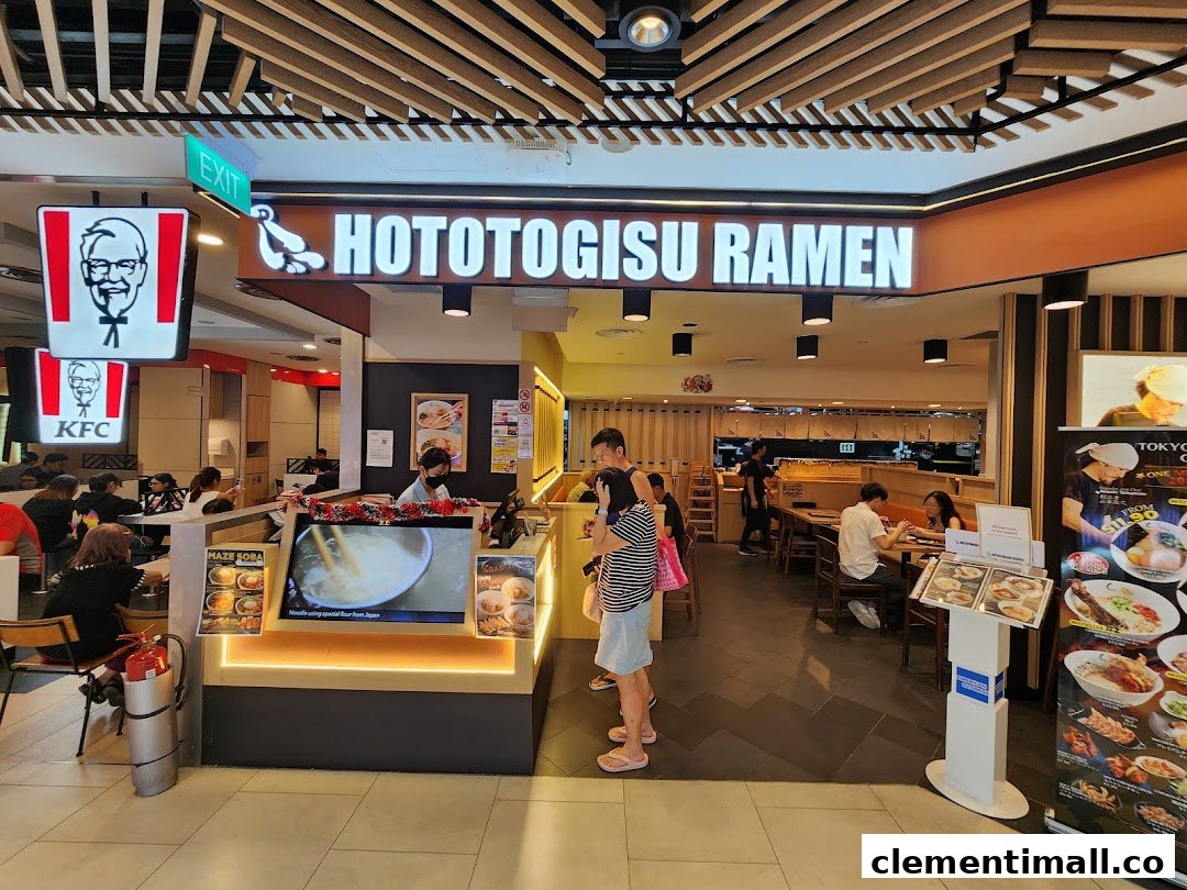 The image captures the inviting entrance and bustling interior of Hototogisu Ramen, with customers dining.
