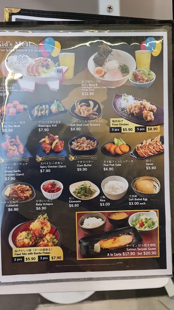 A detailed menu displaying various Japanese dishes, including ramen, fried chicken, and sides, with prices.