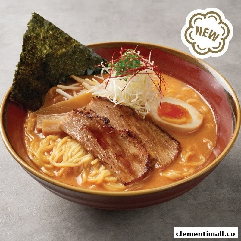 A close-up of a delicious bowl of ramen with chashu, egg, and seaweed, marked as 'NEW'.