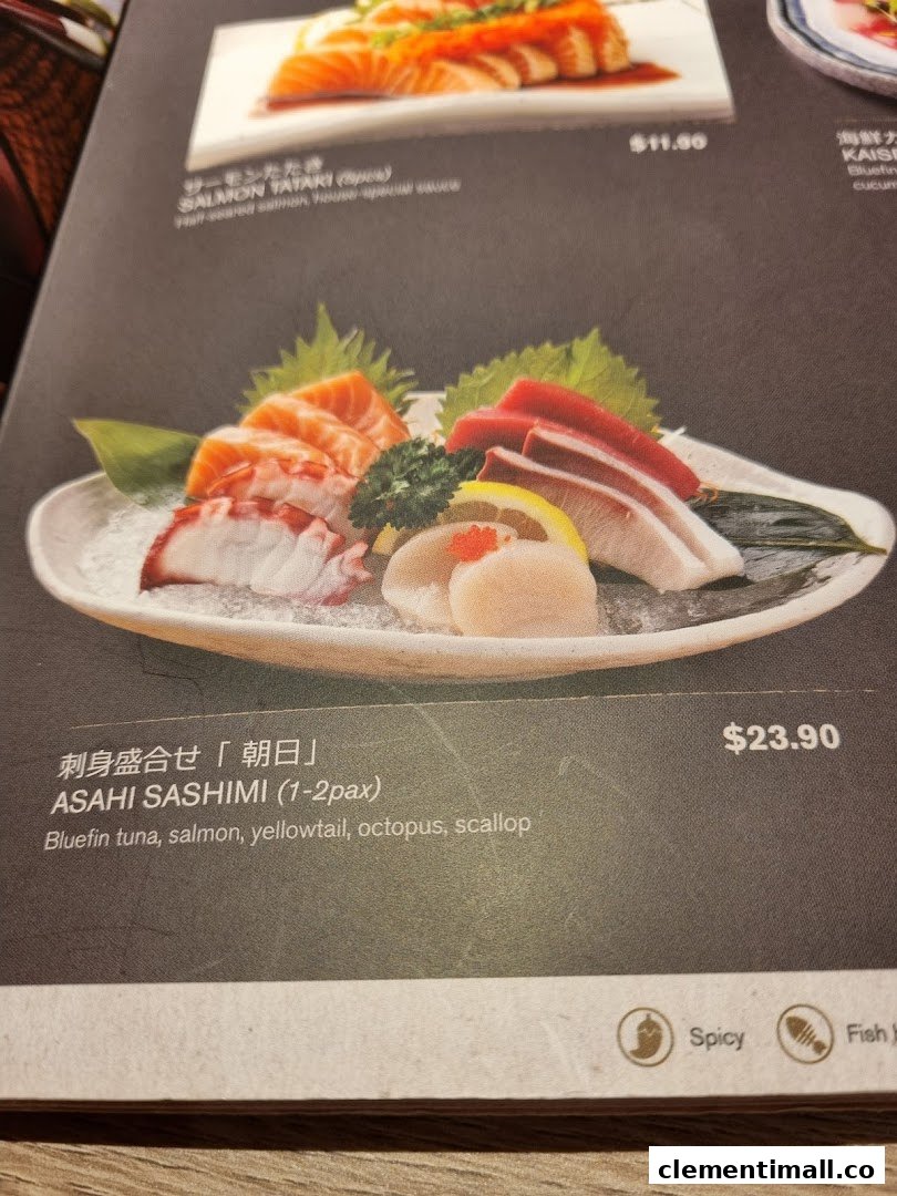 A close-up of a Japanese restaurant menu featuring fresh sashimi and salmon tataki dishes with prices.