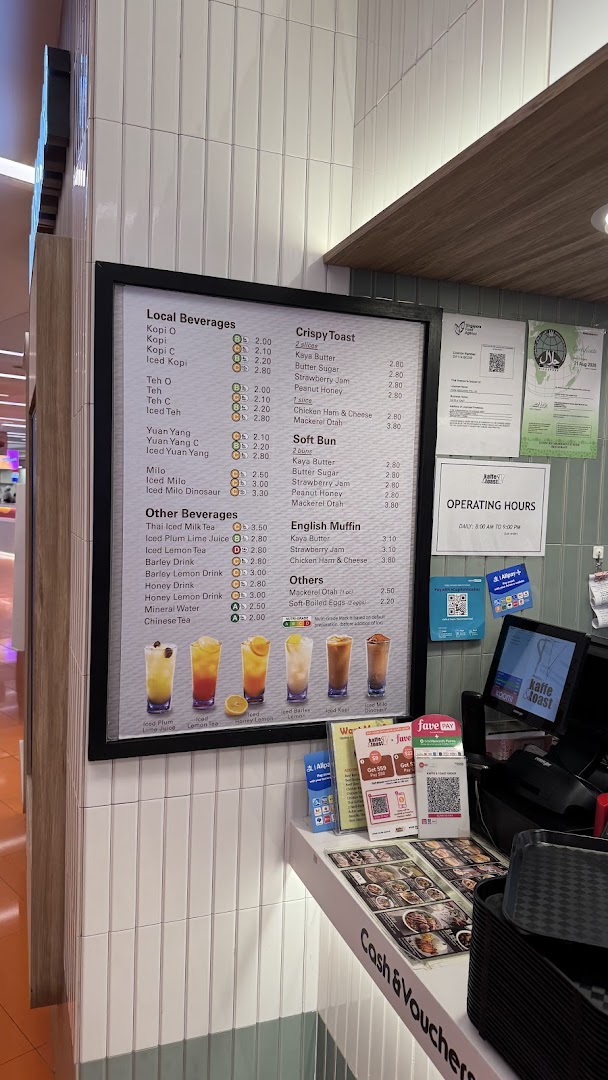 A detailed menu board displaying beverages, toast, and other food items with prices at Kaffe & Toast.