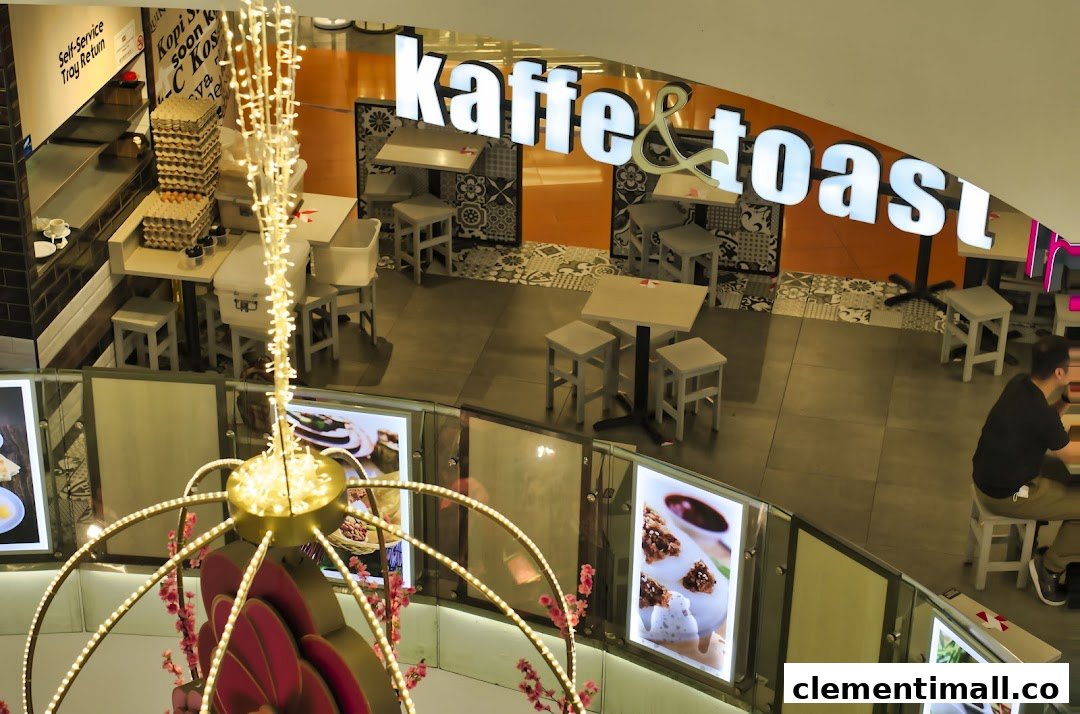 An overhead view of the Kaffe & Toast cafe interior, showing seating, tables, and a self-service area.
