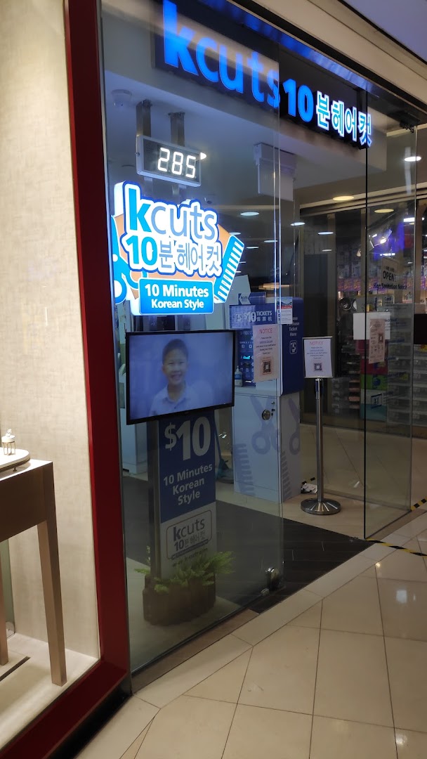 The shop front of kcuts, a hair salon offering 10-minute Korean style haircuts for $10.